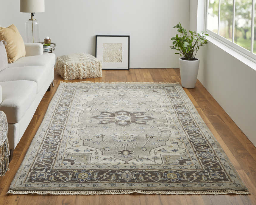 Living room scene with a Feizy Ustad Traditional Persian rug in gray, taupe, and blue under a white sofa. Roomscene-Rectangle