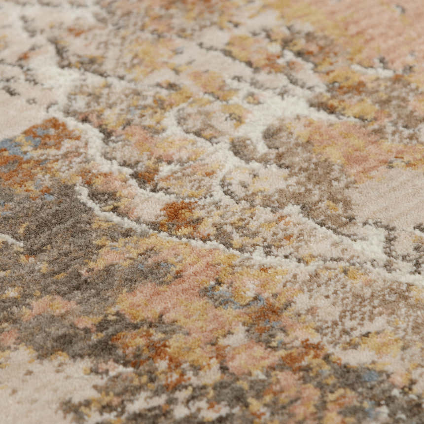 Close-up of Rizzy LOG734 area rug featuring an abstract pattern in beige, rust, and dark red hues. Recycled polyester texture. Texture