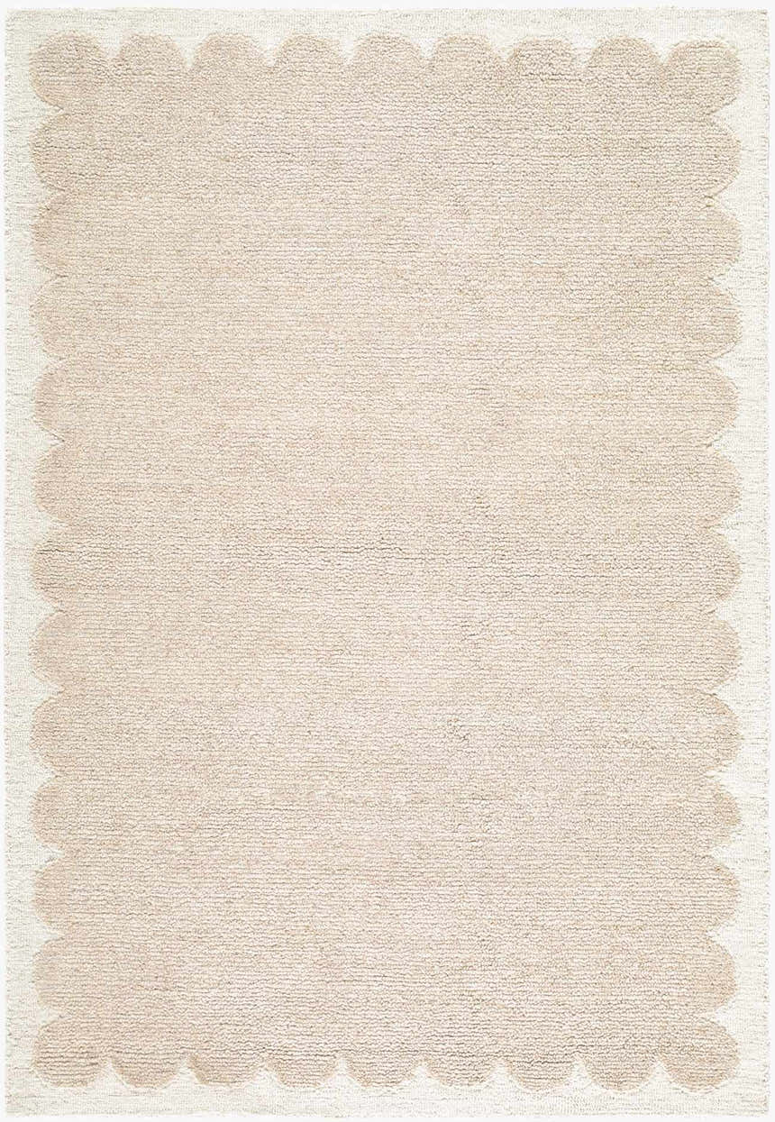 Close-up of the Lytufa Modern Art Deco rug. Hand-tufted wool rug in beige and cream with a scalloped edge. Design-Rectangle