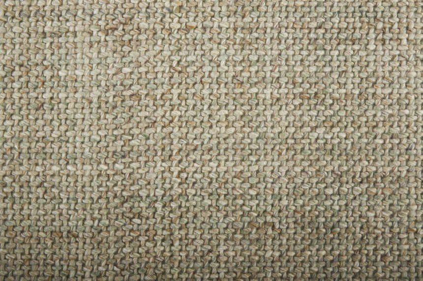 Close-up of the hand-woven texture of the Feizy Naples Green and Tan Area Rug. Polyester rug with casual style. Texture