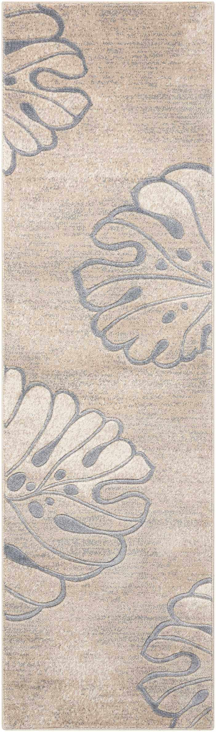 Close up of the Nourison Maxell Beige rug, showing a modern floral pattern and soft, neutral colors.