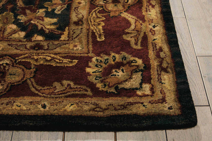 Close up of the Nourison Jaipur Black Persian rug showing wool texture and floral design.