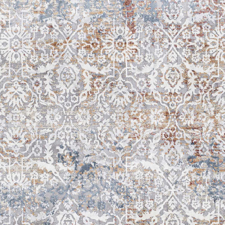 Close-up of the Marden Textured Luxe Area Rug showing its traditional floral pattern in brick red, camel, gray, and blue. Swatch
