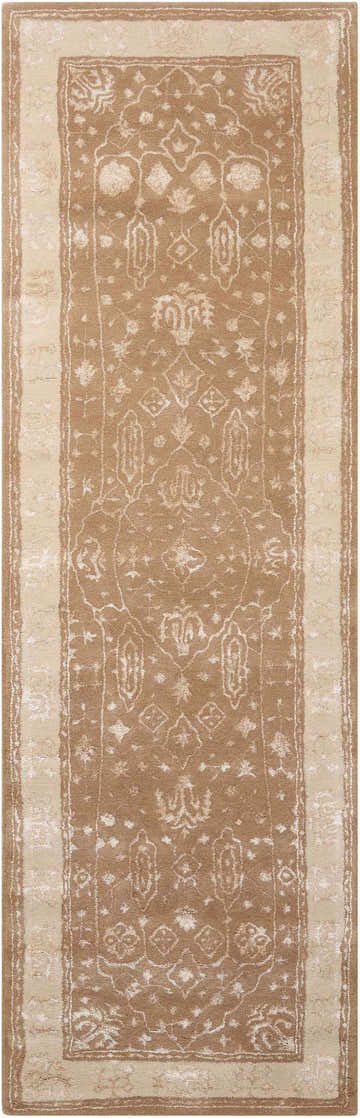Close-up of the Nourison Symphony Warm Taupe Indoor Area Rug. Features a traditional ivory pattern on a taupe wool blend.