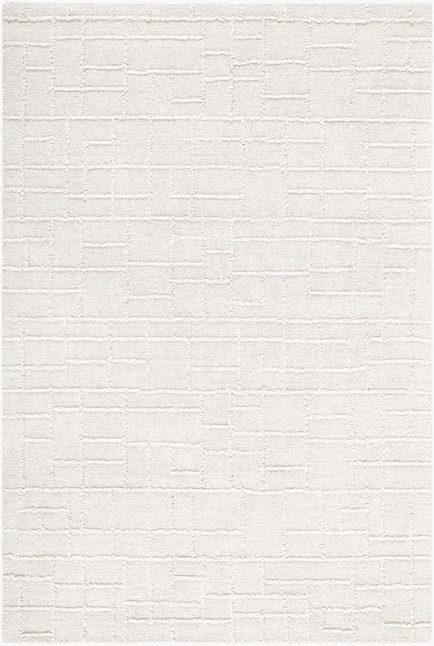 Close-up of the hand-tufted Larkollen Area Rug. The 100% wool rug features a contemporary, textured block pattern in off-white. Design-Rectangle-576