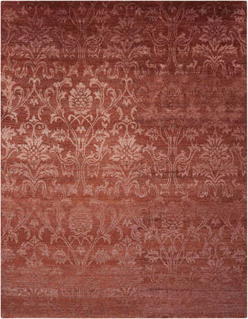 Close-up of the Nourison Silk Shadows Rust Area Rug, featuring a subtle floral damask pattern and soft, silk-like texture.