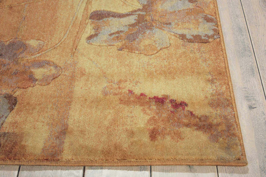 Close up of the beige Nourison Somerset rug showing floral pattern and texture.