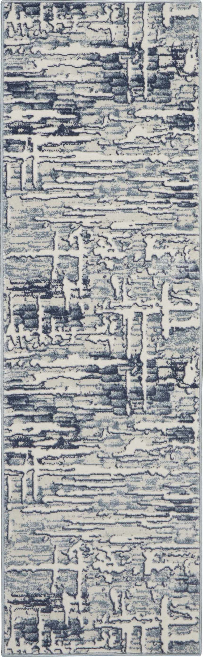 Close-up of the Nourison Urban Chic Ivory rug, showcasing its chestnut abstract pattern and soft texture.