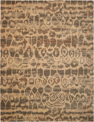 Close-up of a Nourison Silken Allure rug. Multicolor wool rug with a mid-century modern pattern and distressed texture.