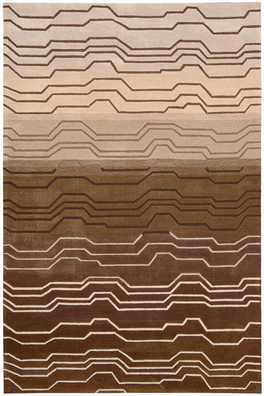 Close-up of Nourison Contour Natural Eclectic Indoor Area Rug. Brick red, brown, and beige geometric pattern. Handmade rug.