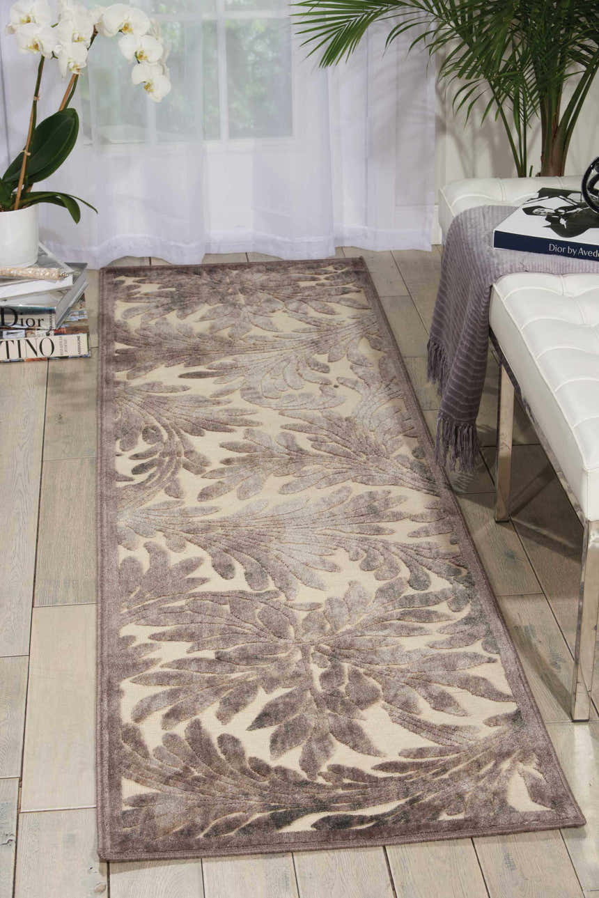 Entryway scene with ivory walls and Nourison Graphic Illusions Chestnut runner rug with floral pattern.