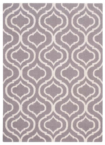 Close-up of Nourison Linear Silver Moroccan rug; handmade wool rug with a gray and white quatrefoil pattern.