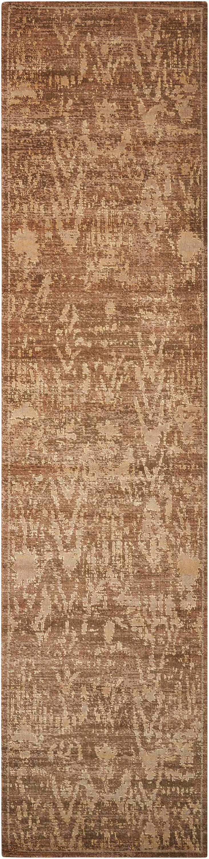 Close-up of the brown Nourison Silken Allure Chocolate Persian rug. Features a distressed, abstract design and soft texture.