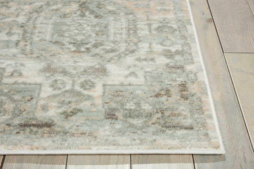 Close-up of the Nourison Euphoria Ivory Persian rug, showcasing its detailed pattern and soft chestnut, ivory, and gray tones.