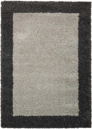 Close-up of the Nourison Amore Silver Charcoal Shag Rug, featuring a taupe center and charcoal border. Soft texture.