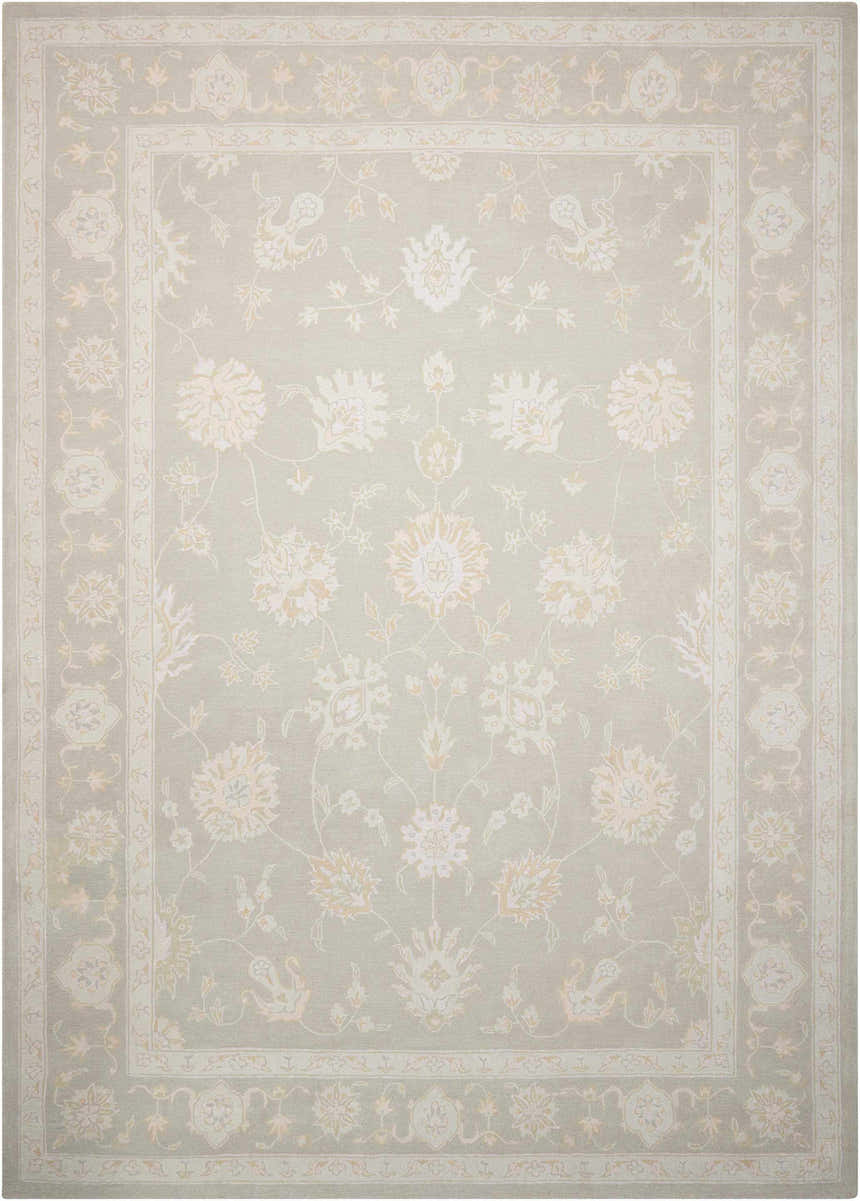 Close-up of the Nourison Zephyr Silver rug. Handmade wool rug with floral and vine pattern in silver gray and cream.