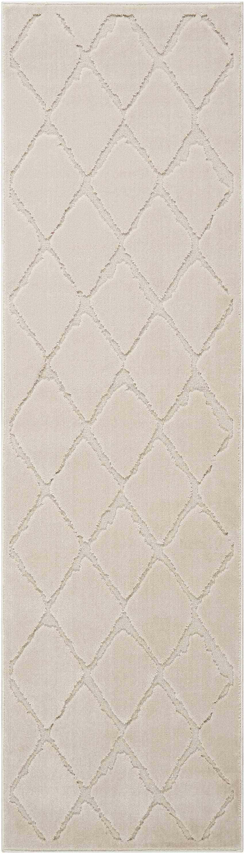 Close-up of the Michael Amini Gleam Ivory rug. Diamond pattern in shades of ivory and cream. Mid-century modern style.