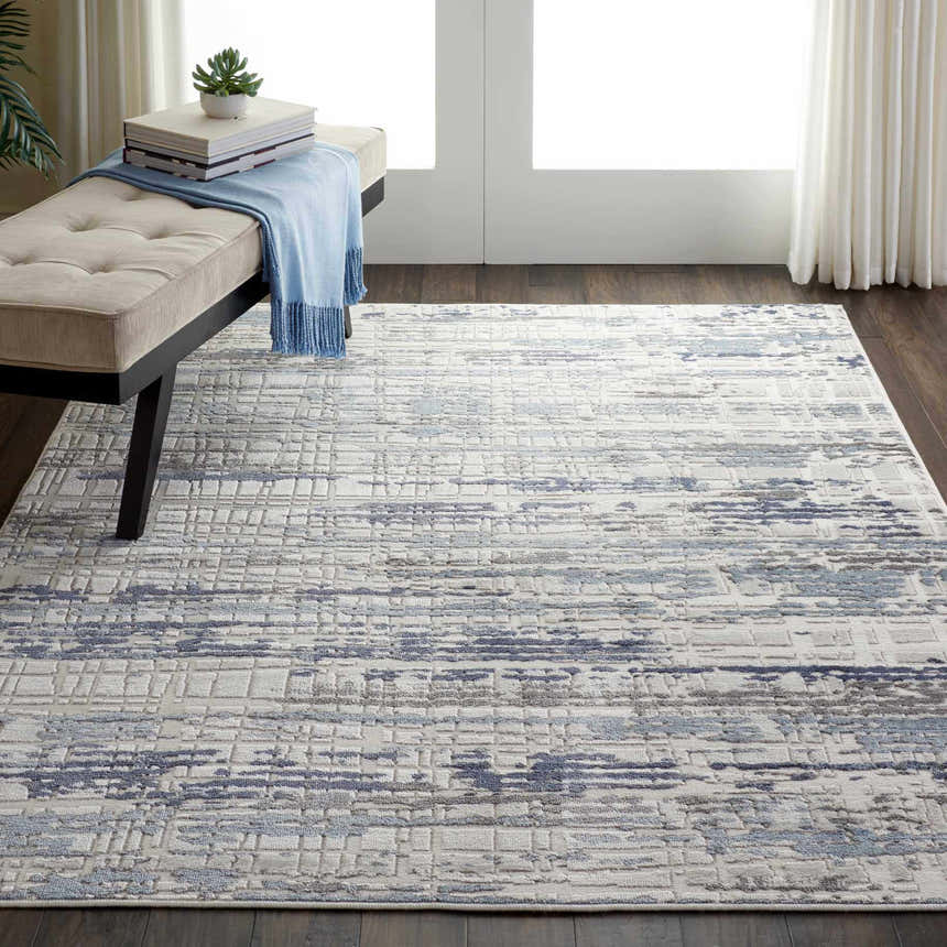 Entryway with a bench on a Nourison Urban Decor Slate/Ivory rug. Modern style.
