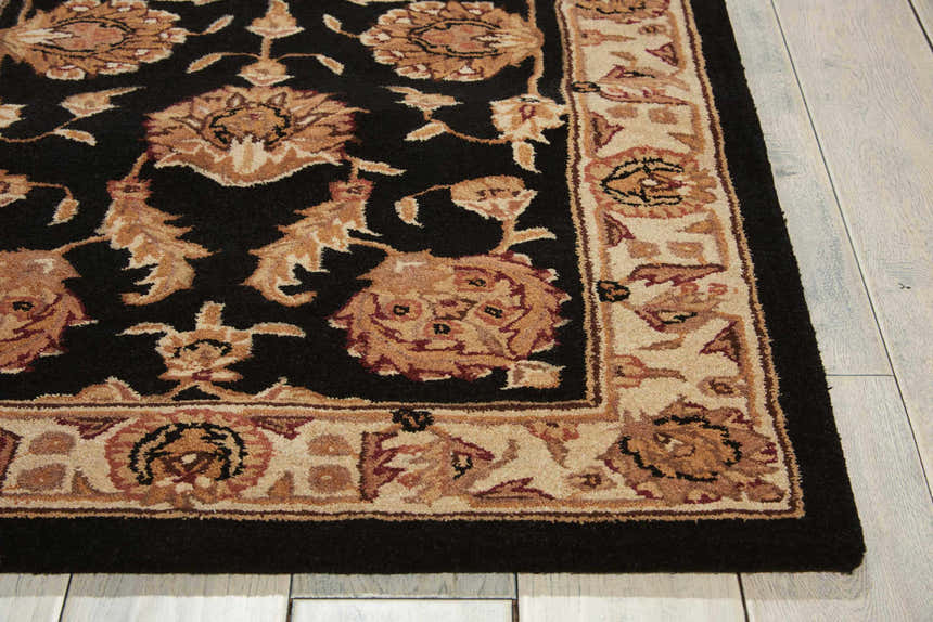 Close-up of the Nourison Heritage Hall Freeform Black Persian Rug, showcasing its floral pattern and wool texture.