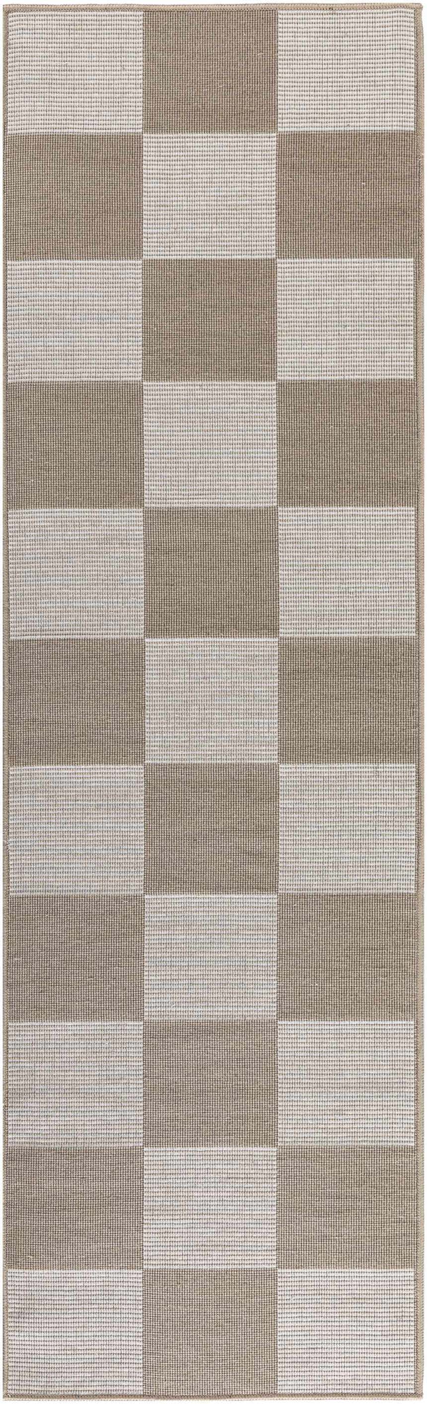 Close-up of the Nourison Modern Jute Natural Ivory rug, showcasing the chestnut and ivory checkerboard pattern and woven texture.