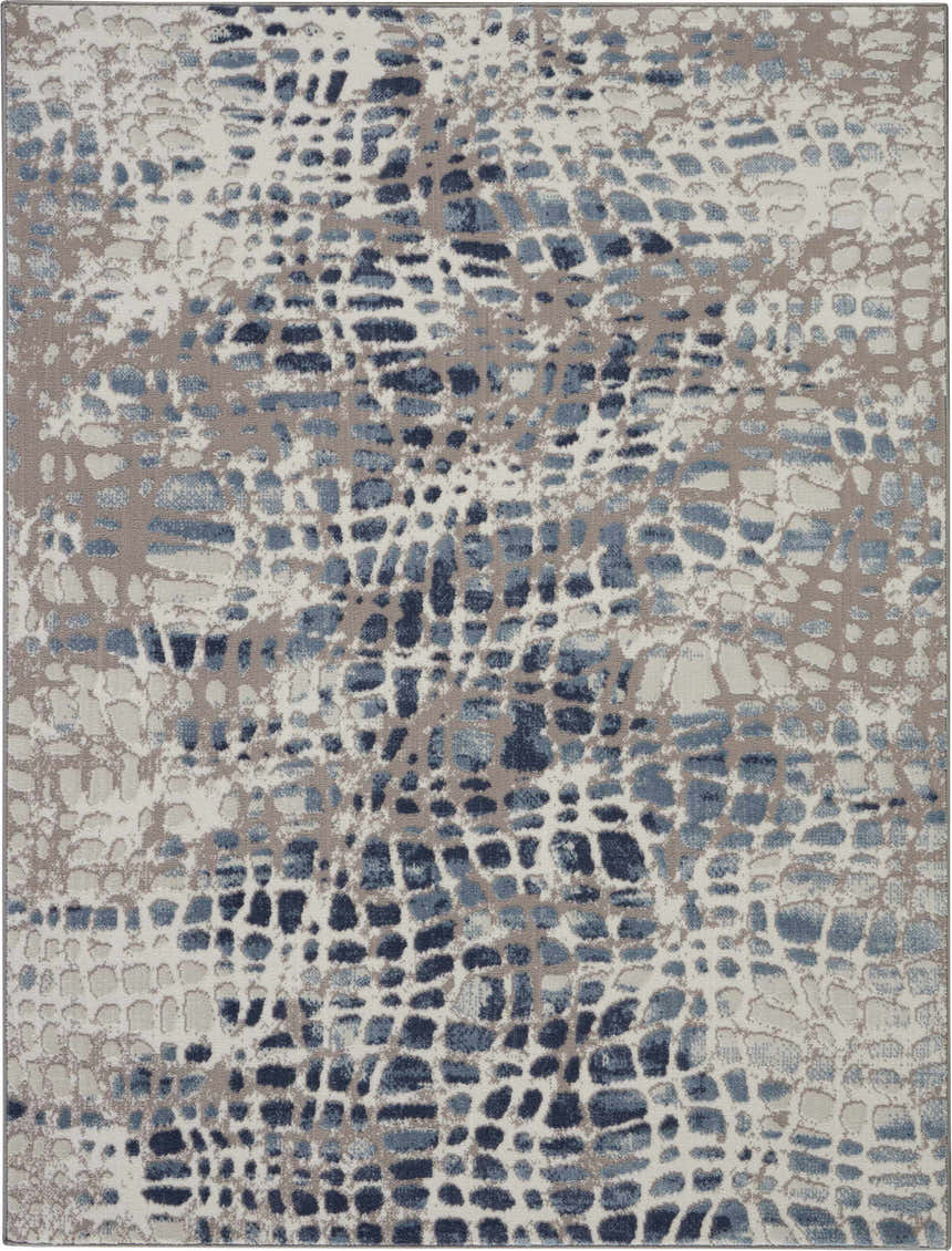 Close-up of Nourison Urban Decor Ivory/Grey Area Rug. Modern design with chestnut accents and abstract pattern.