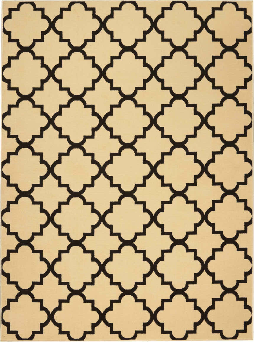 Close-up of Nourison Grafix Cream Black Moroccan rug featuring a quatrefoil pattern. Rectangle shape.