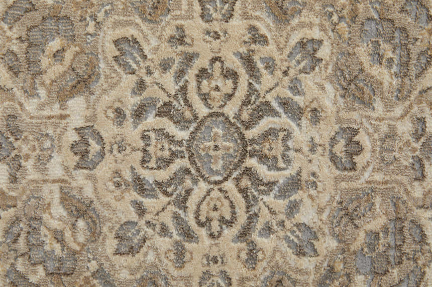 Close-up of Feizy Celene Traditional Medallion rug. Tan, brown, and ivory floral medallion pattern. Soft texture. Texture
