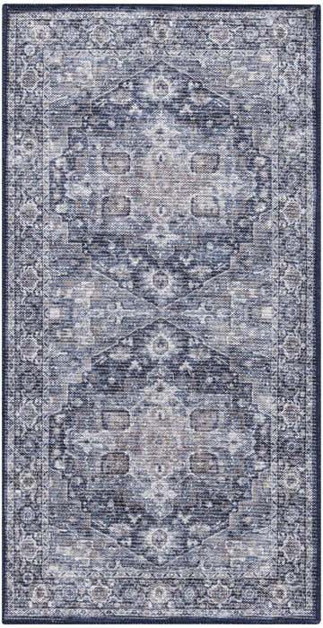 Close-up of Nourison New Concept Ivory Navy Vintage Rug, featuring a detailed traditional pattern and soft texture.