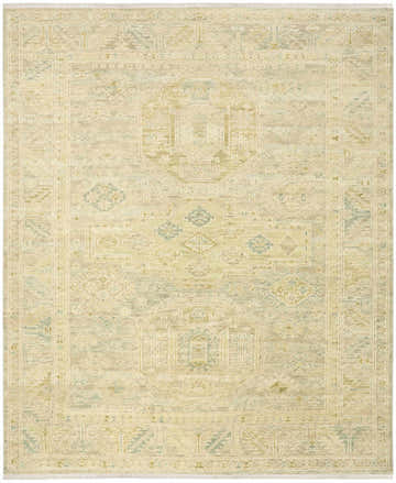 Close-up of the handmade Nourison Odessa Green Vintage Area Rug, showcasing its geometric pattern and soft wool texture.