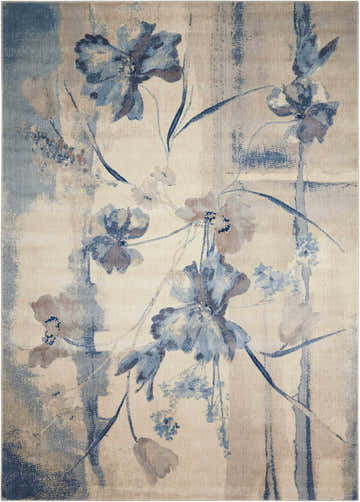 Close-up of the Nourison Somerset Ivory Blue rug, showcasing its floral pattern and soft, muted colors.