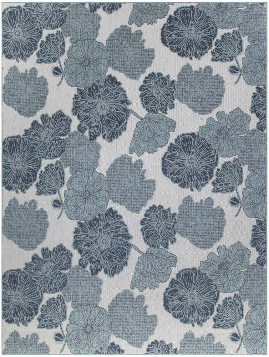 Close-up of the Nourison Garden Oasis Blue Tropical Area Rug, featuring a floral pattern in light and dark blue hues.
