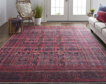 Living room scene with Feizy Voss Transitional Oriental rug in red and gray, sofa, and wicker chair. Roomscene-Rectangle