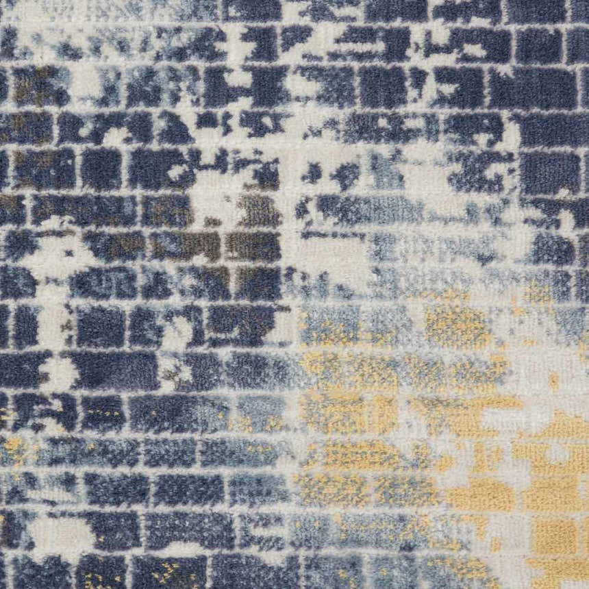 Close-up of Nourison Urban Decor Ivory/Sky Rug, featuring a brick-like pattern in blue, gray, and yellow on an ivory background.