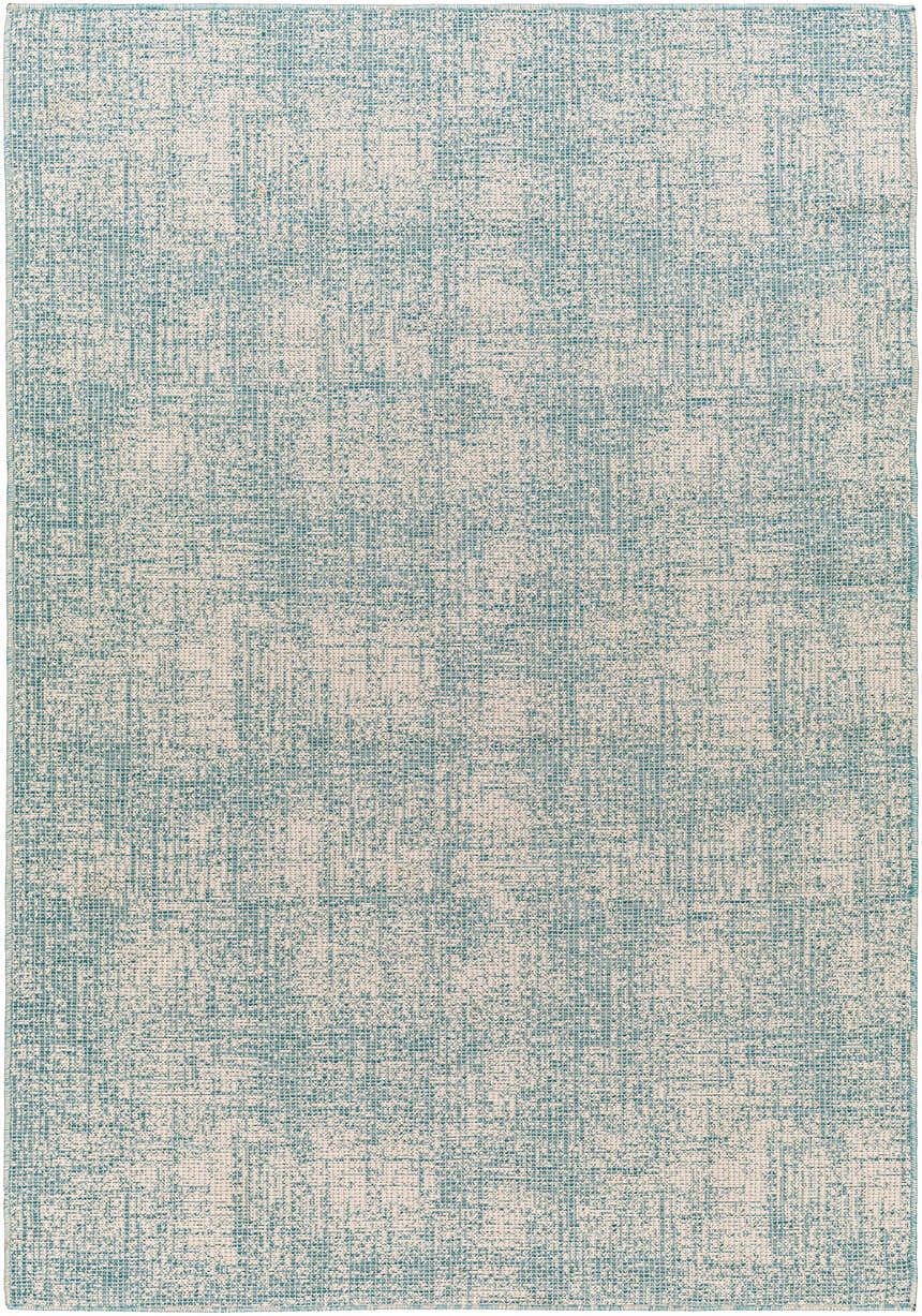Close-up of Rhea Area Rug in denim and natural gray. Contemporary style, machine woven texture. Design-Rectangle-517