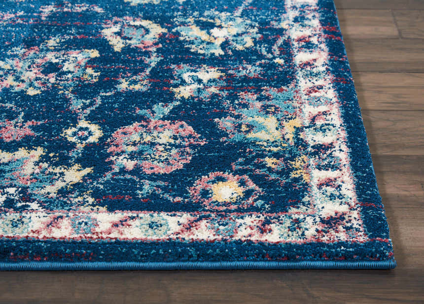Close-up of the Nourison Fusion Navy Pink Persian Indoor Area Rug showing its texture and pattern.