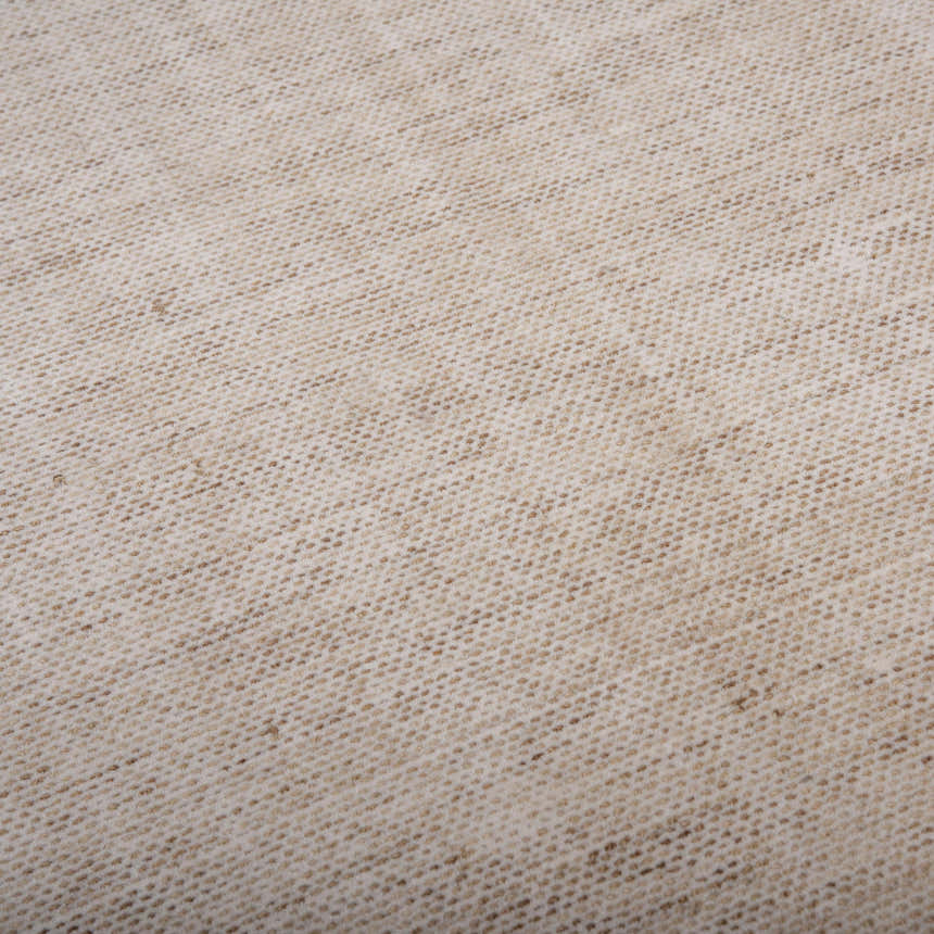Close-up of the hand-loomed Rizzy RMI677 area rug. Beige and light brown tone on tone wool texture. Texture
