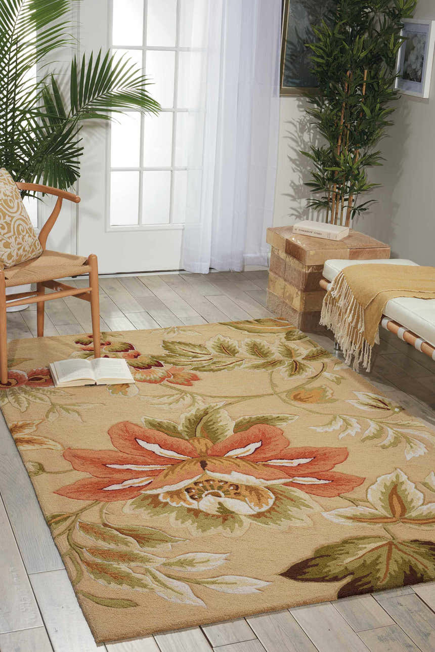 Sunlit room with a Nourison Fantasy Beige rug featuring large floral patterns, a chair, and bench.