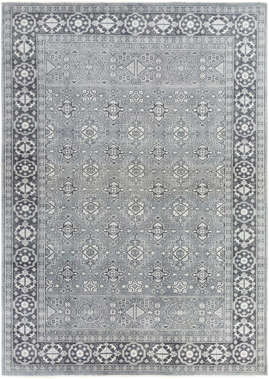 Close-up of the hand-knotted Sherwood Area Rug. Bohemian style with ice blue, ink blue, and teal oriental rug pattern. Design-Rectangle-811