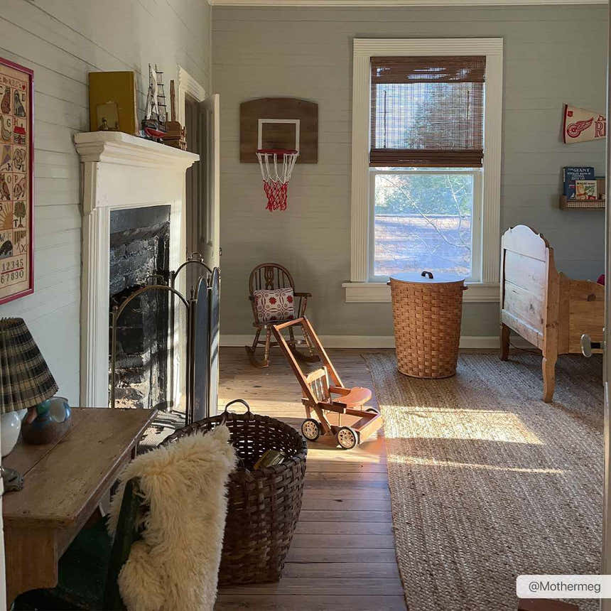 Farmhouse kids room with Shippagan Tan Jute Braided Rug, wood floors, and vintage toys. Natural light. Roomscene-Rectangle