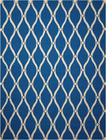 Close-up of Nourison Portico Navy Colorful Area Rug with a cream trellis pattern on a blue background.