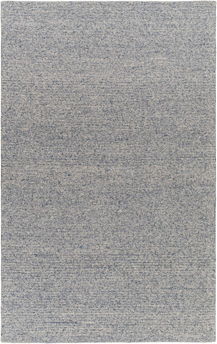 Close-up of Alyra Light Blue Solid Area Rug. Hand-woven wool rug with a subtle textured pattern. Design-Rectangle-576