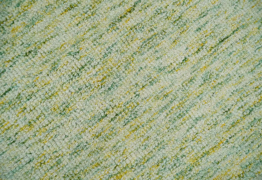 Custom Made Solid Green And Ivory Hand Tufted Natural Wool Area Rug