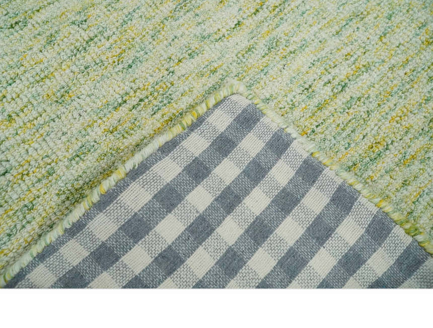Custom Made Solid Green And Ivory Hand Tufted Natural Wool Area Rug
