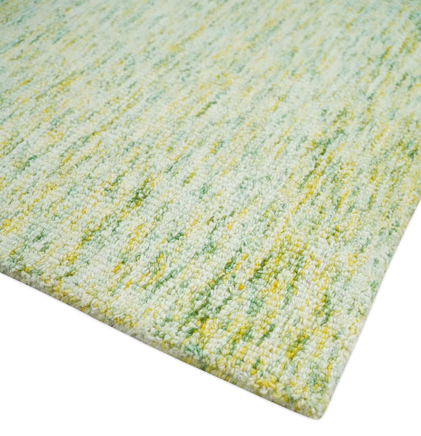 Custom Made Solid Green And Ivory Hand Tufted Natural Wool Area Rug