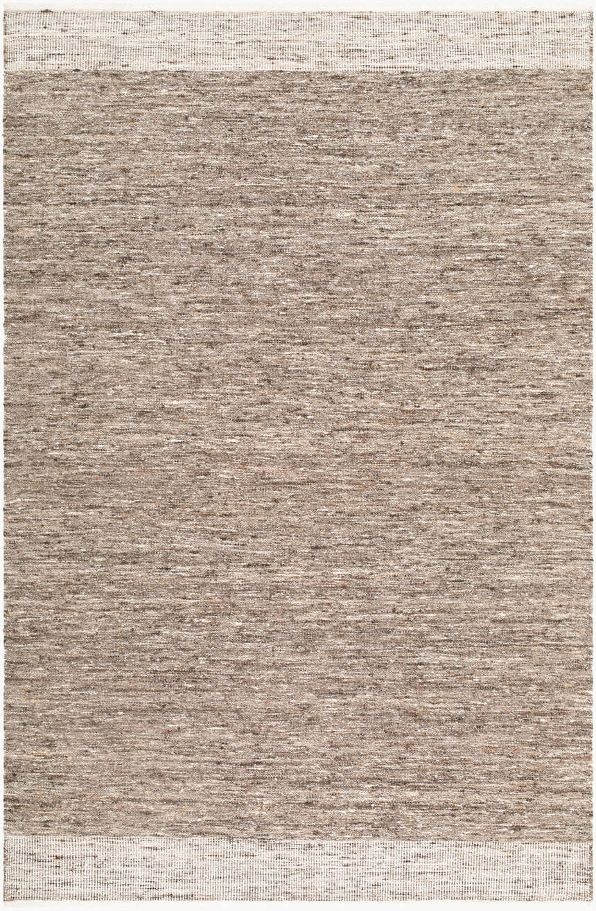 Close-up of the hand woven Molbergen Area Rug. The wool rug features charcoal, ivory, and taupe threads. Design-Rectangle-576