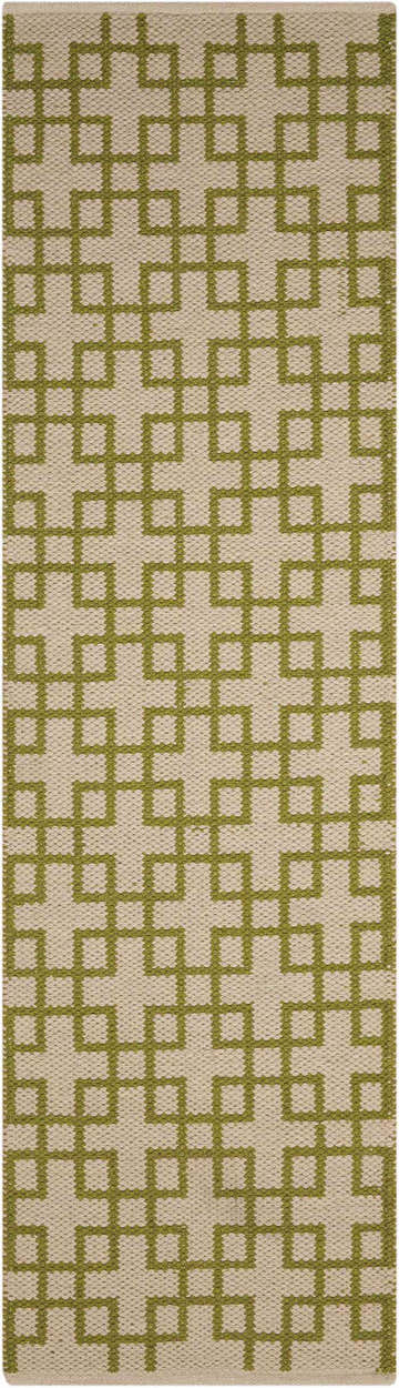 Close-up of the Barclay Butera Maze Moss rug. Olive geometric maze pattern on a textured beige wool rug.