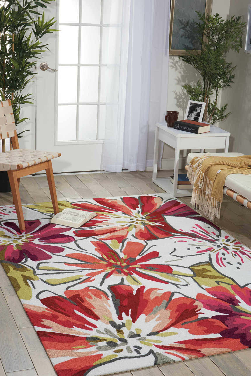 Bright living room with Nourison Fantasy Ivory rug featuring large chestnut floral pattern.