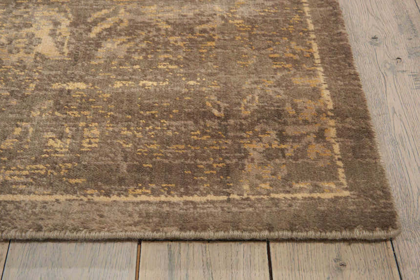Close-up of the Nourison Silken Allure Mushroom Persian rug, showing wool texture and subtle gold accents.