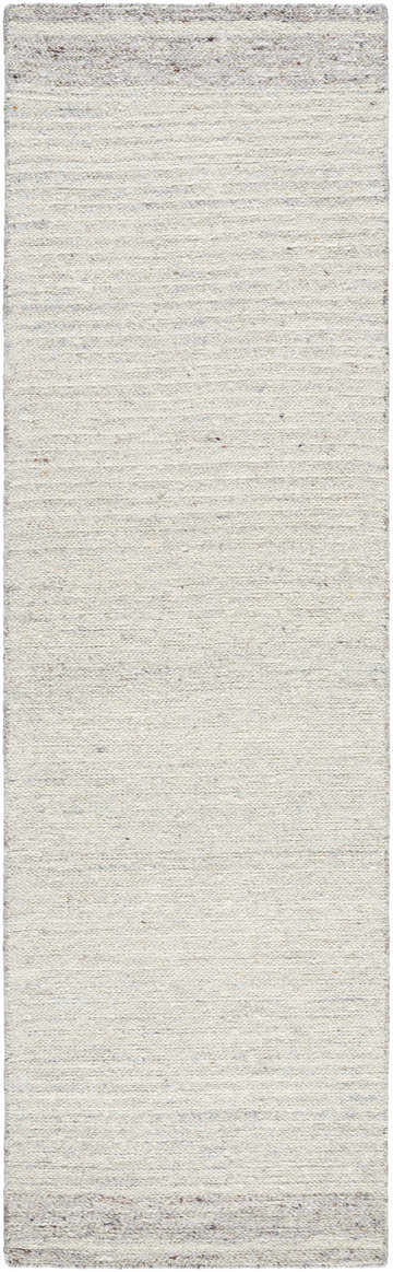 Close-up of the hand-tufted Thady Area Rug. Ash, light silver, and pearl wool create a subtle, textured design. Design-Runner-310