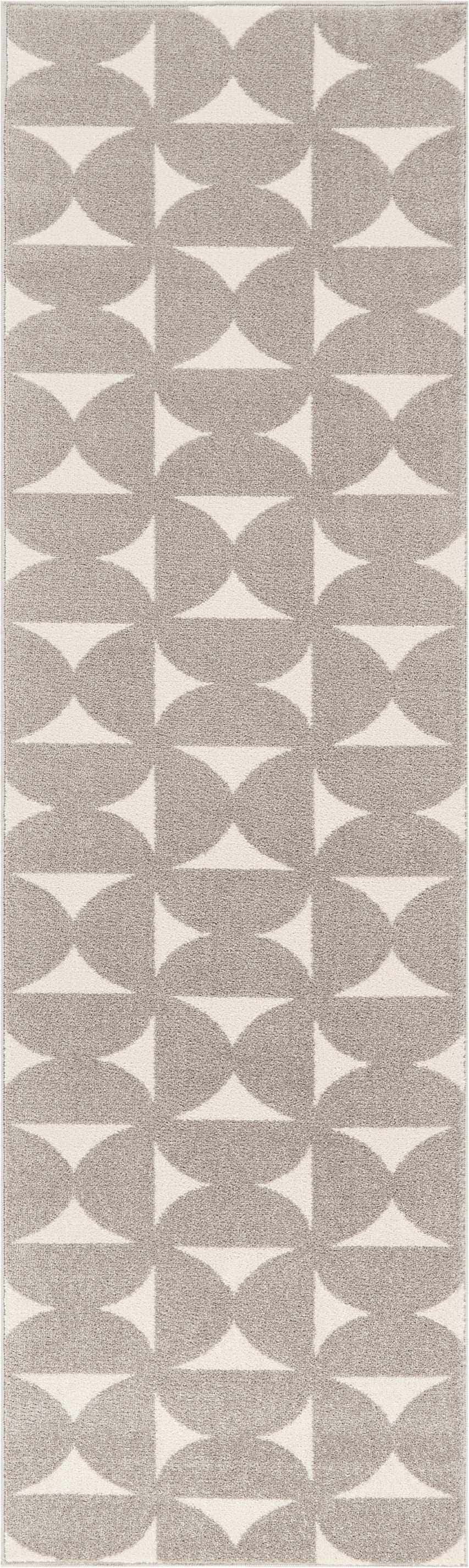 Close-up of Nourison Harper Grey Colorful rug featuring a geometric pattern of gray circles and triangles.
